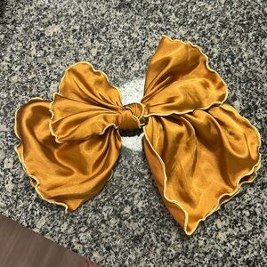 Anthropologie burnt orange hair bow clip
